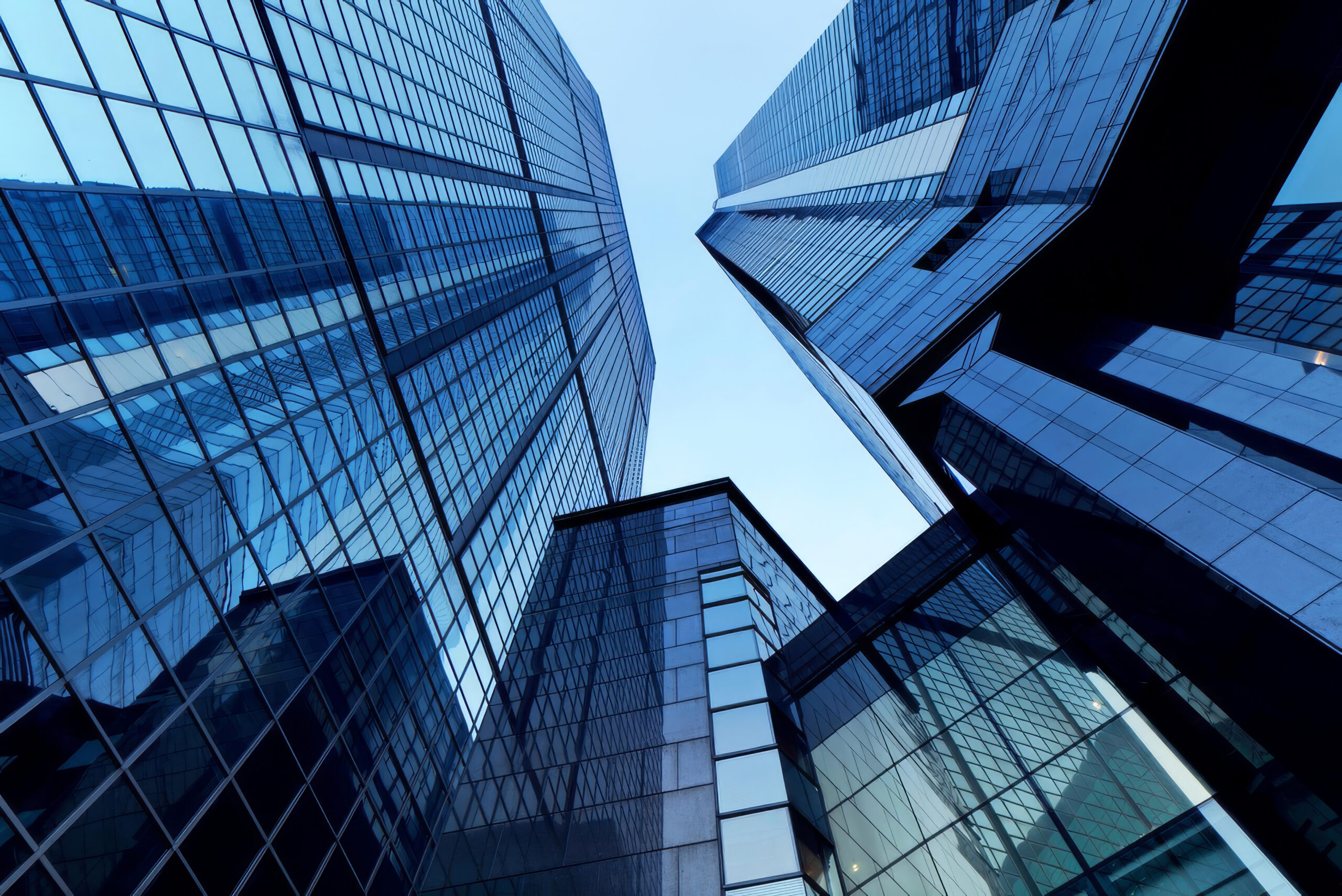 Commercial towers seen from street level.